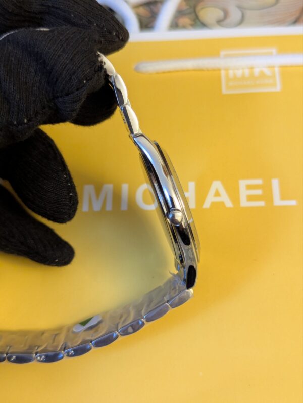 2026/05/158392-scaled.jpg Michael Kors Slim Runway Silver-Tone Watch (Model: MK3178).
