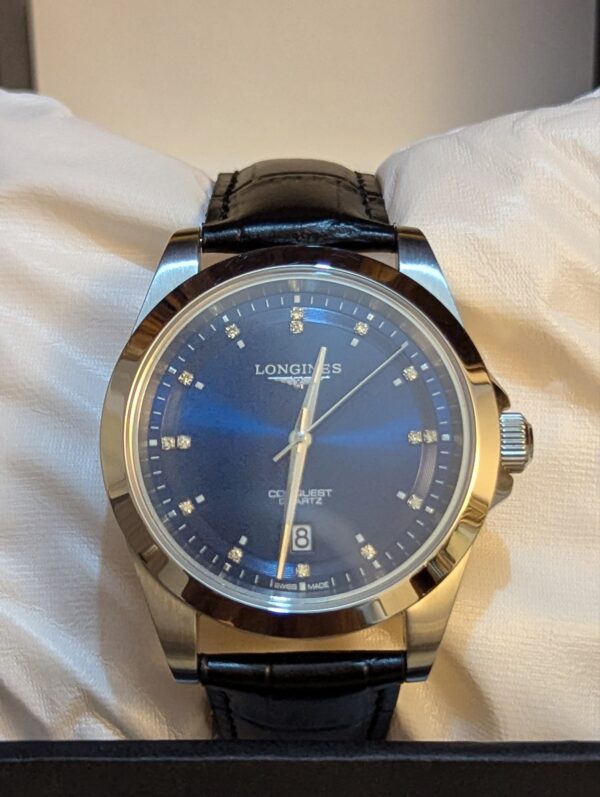 2026/10/68146-scaled.jpg Longines Conquest Quartz Men's Watch with Blue Dial & Black Leather Strap Price in Pakistan