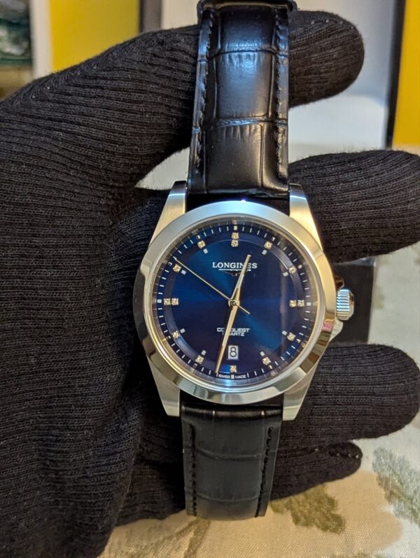 2026/10/68148-scaled.jpg Longines Conquest Quartz Men's Watch with Blue Dial & Black Leather Strap Price in Pakistan
