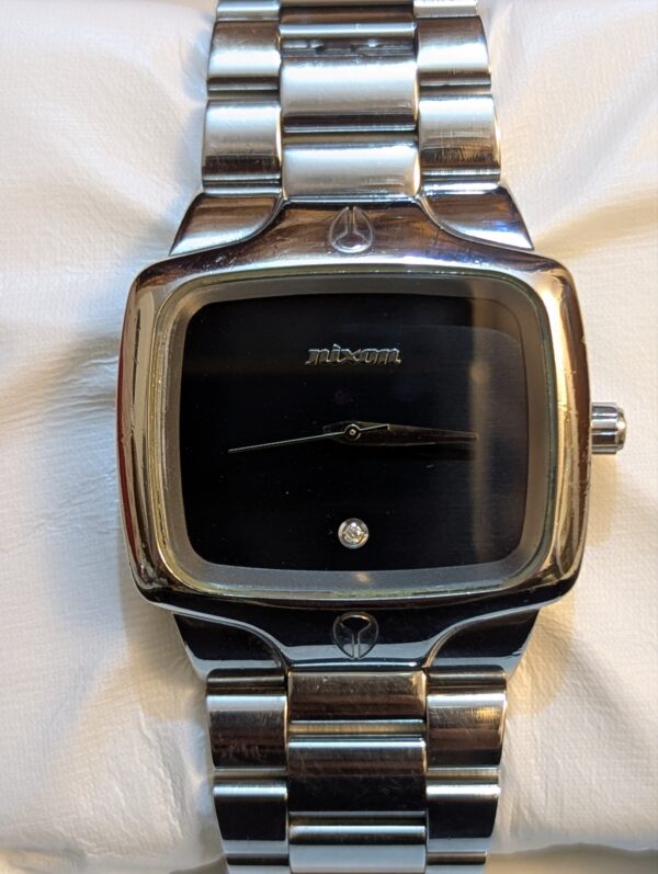 Nixon "The Player" Watch (specifically the classic silver stainless steel