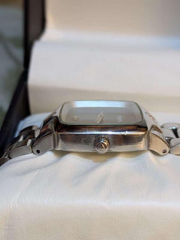 Nixon "The Player" Watch (specifically the classic silver stainless steel