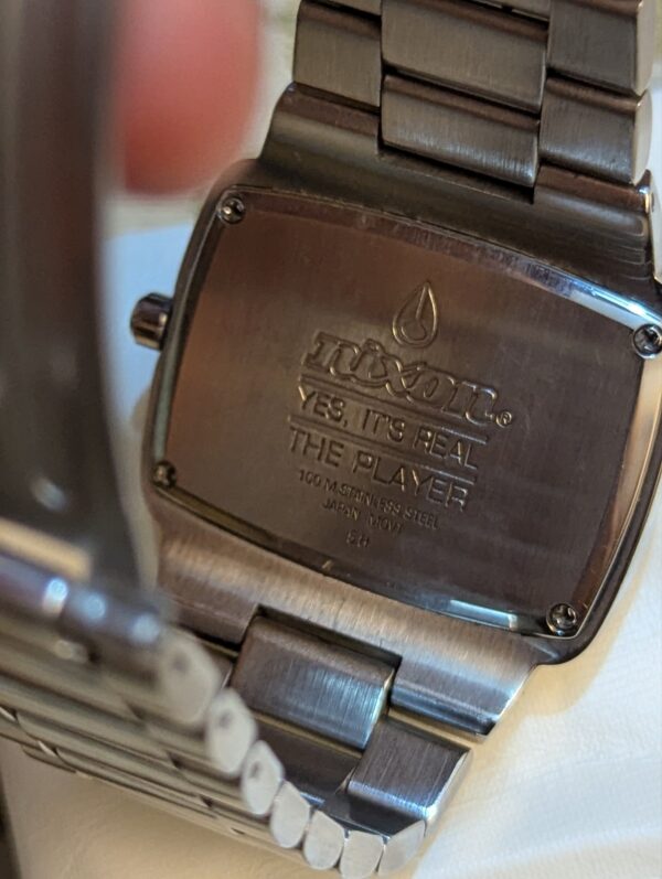 Nixon "The Player" Watch (specifically the classic silver stainless steel